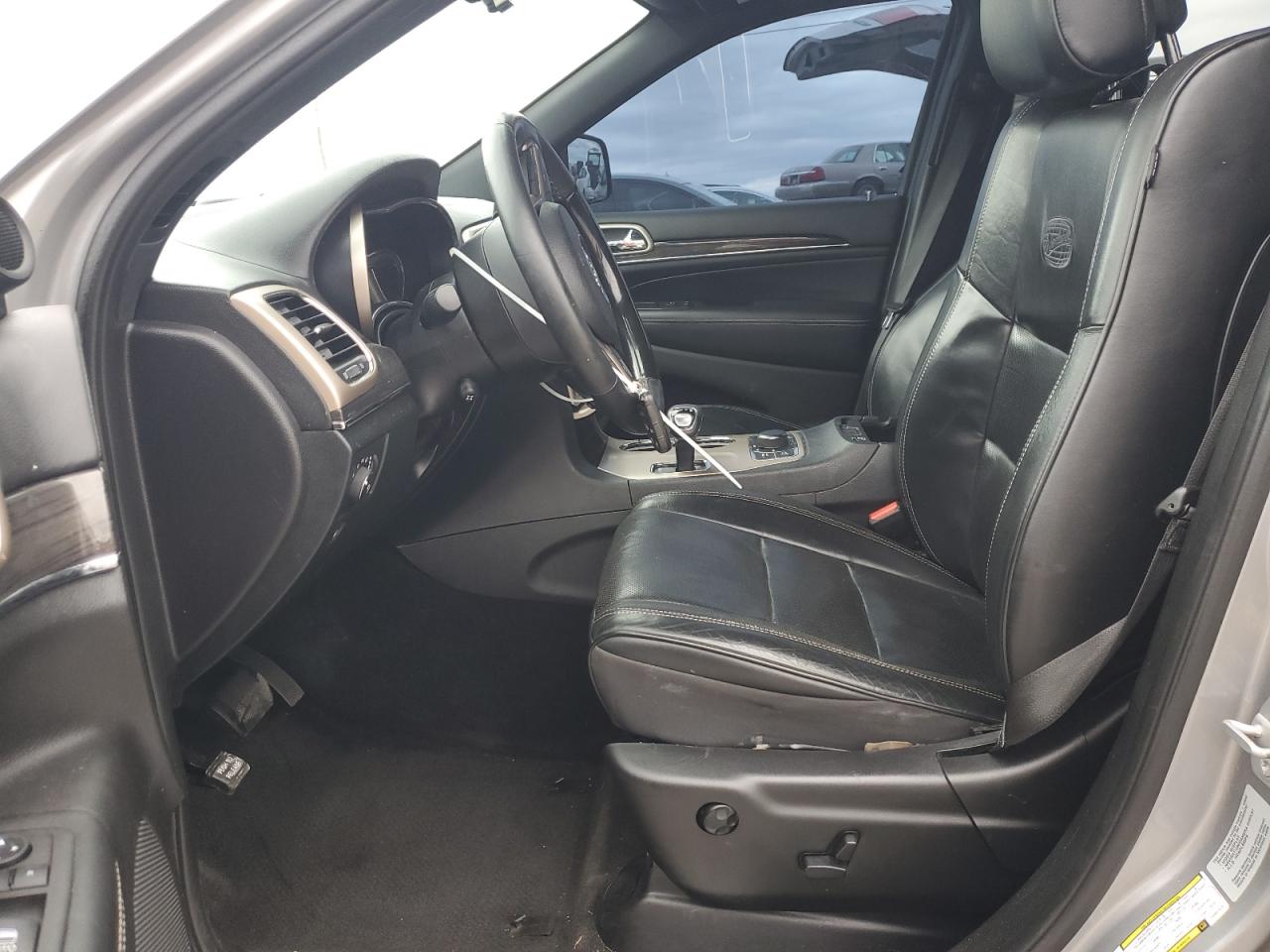 2015 Jeep Grand Cherokee VIN 1C4RJFCG9FC847574 Copart auction photo, rear end / side damage thumbnail 7