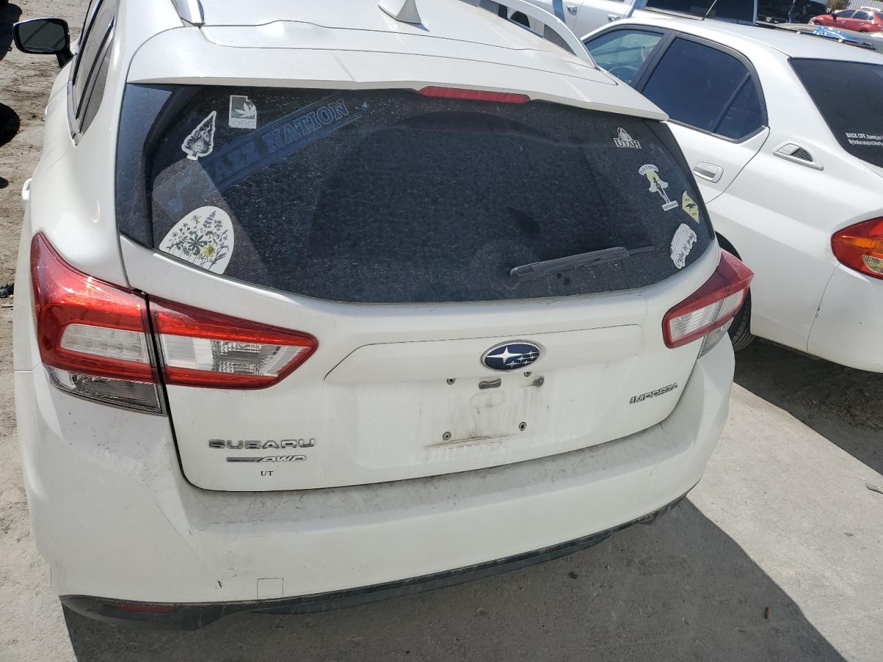2019 Subaru Impreza VIN 4S3GTAD66K3707499 Copart auction photo, side / front end damage thumbnail 6