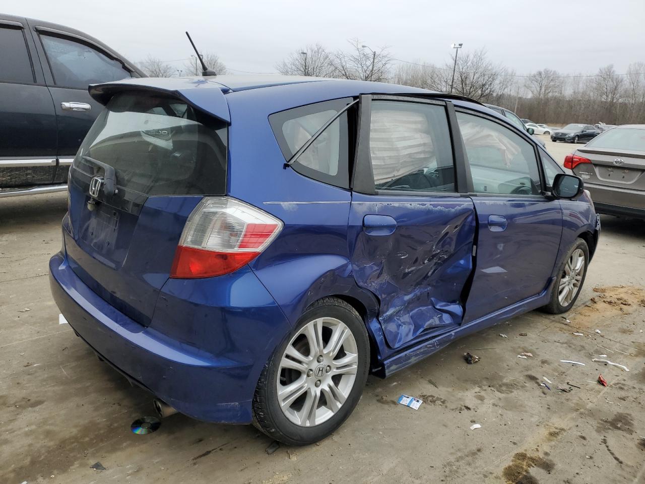 2009 Honda Fit VIN JHMGE88689S005244 Copart auction photo, all over damage thumbnail 3
