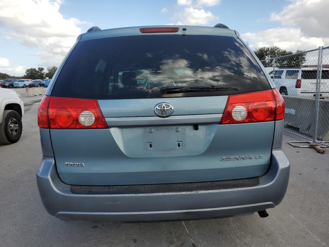 2009 Toyota Sienna VIN 5TDZK23C49S246207 Copart auction photo, front end / minor dent/scratches damage thumbnail 6