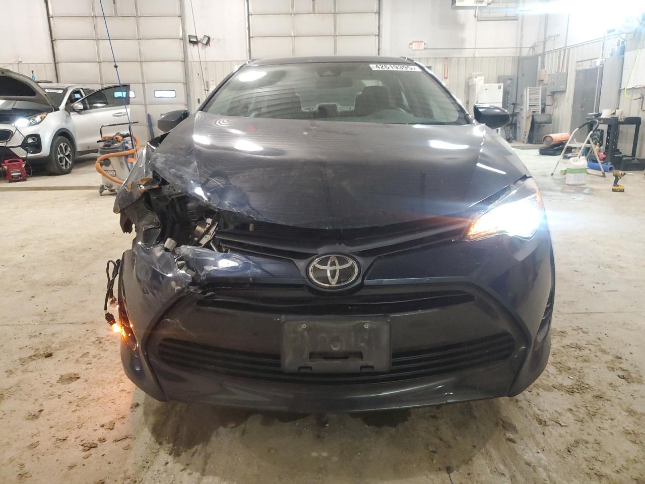 2017 Toyota Corolla VIN 5YFBURHE2HP719995 Copart auction photo, front end / minor dent/scratches damage thumbnail 5