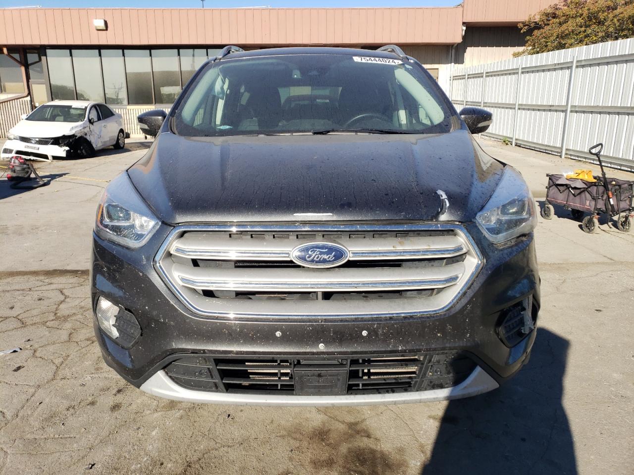 2019 Ford Escape VIN 1FMCU9J94KUA70224 Copart auction photo, front end / side damage thumbnail 5