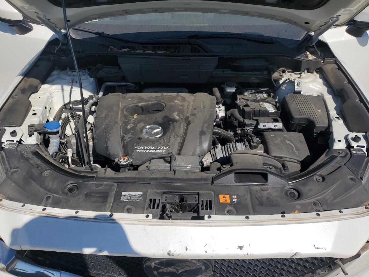 2018 Mazda CX-5 VIN JM3KFADMXJ1377674 Copart auction photo, rear end damage thumbnail 12