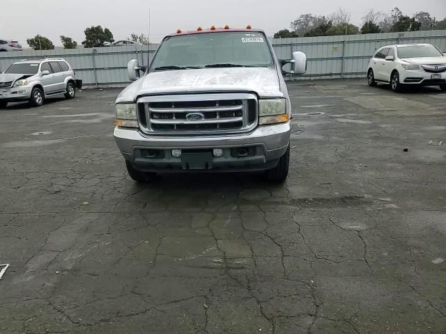2003 Ford F250 VIN 1FTNW20P03EC34109 Copart auction photo, vandalism damage thumbnail 10