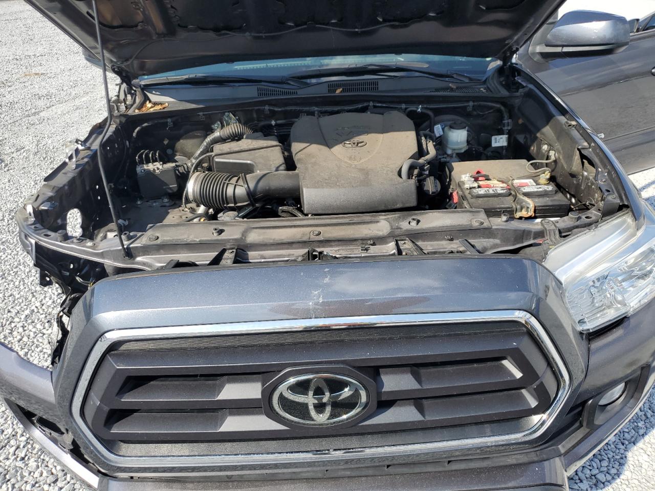 2021 Toyota Tacoma VIN 5TFAZ5CN1MX098192 Copart auction photo, front end / side damage thumbnail 11