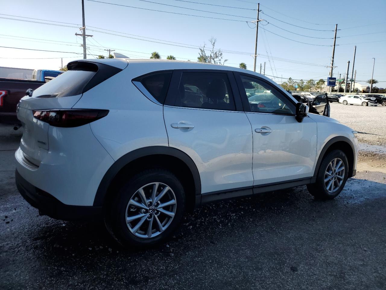2023 Mazda CX-5 VIN JM3KFBBM9P0252379 Copart auction photo, side damage thumbnail 3