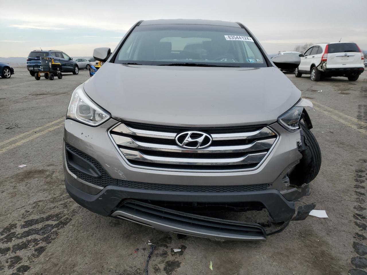 2016 Hyundai Santa Fe VIN 5XYZTDLB0GG377533 Copart auction photo, front end / side damage thumbnail 5