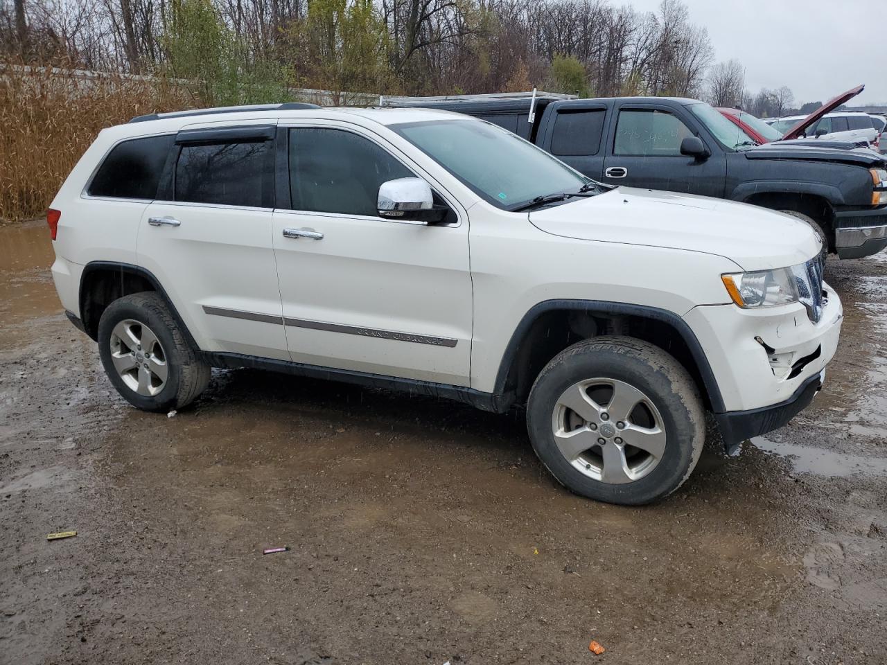 2012 Jeep Grand Cherokee VIN 1C4RJFBG7CC267589 Copart auction photo, front end / minor dent/scratches damage thumbnail 4