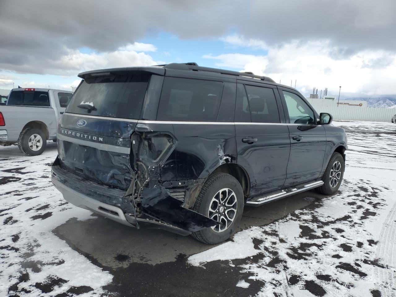 2023 Ford Expedition VIN 1FMJU1J84PEA51268 Copart auction photo, rear end / front end damage thumbnail 3