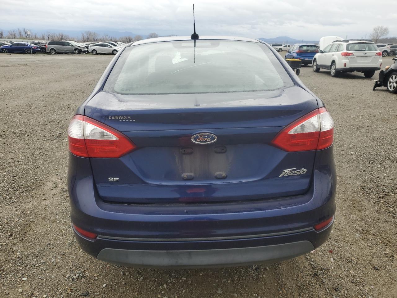 2016 Ford Fiesta VIN 3FADP4BJ1GM205561 Copart auction photo, front end / side damage thumbnail 6