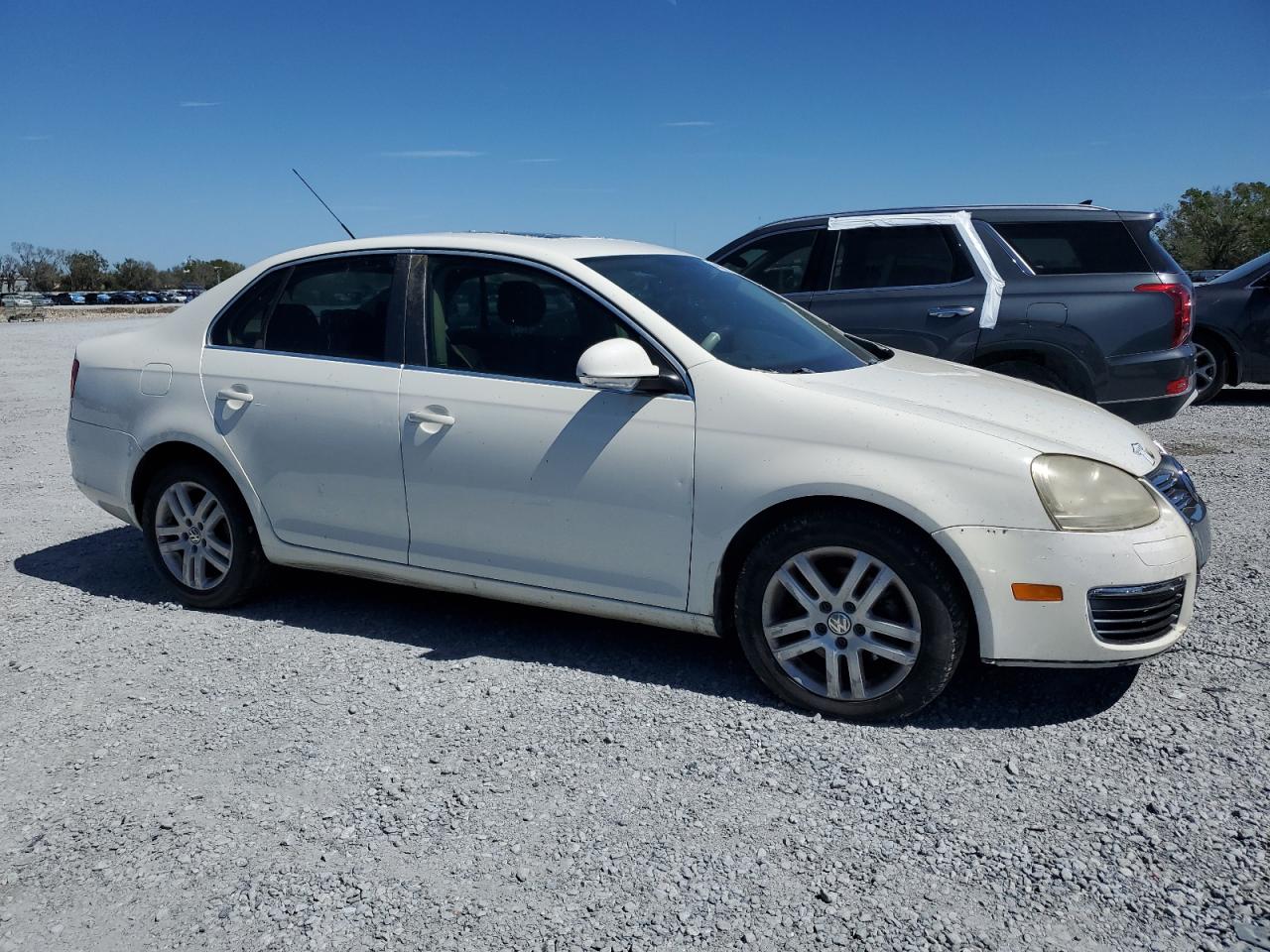 2007 Volkswagen Jetta VIN 3VWEF71K37M077706 Copart auction photo, side / front end damage thumbnail 4