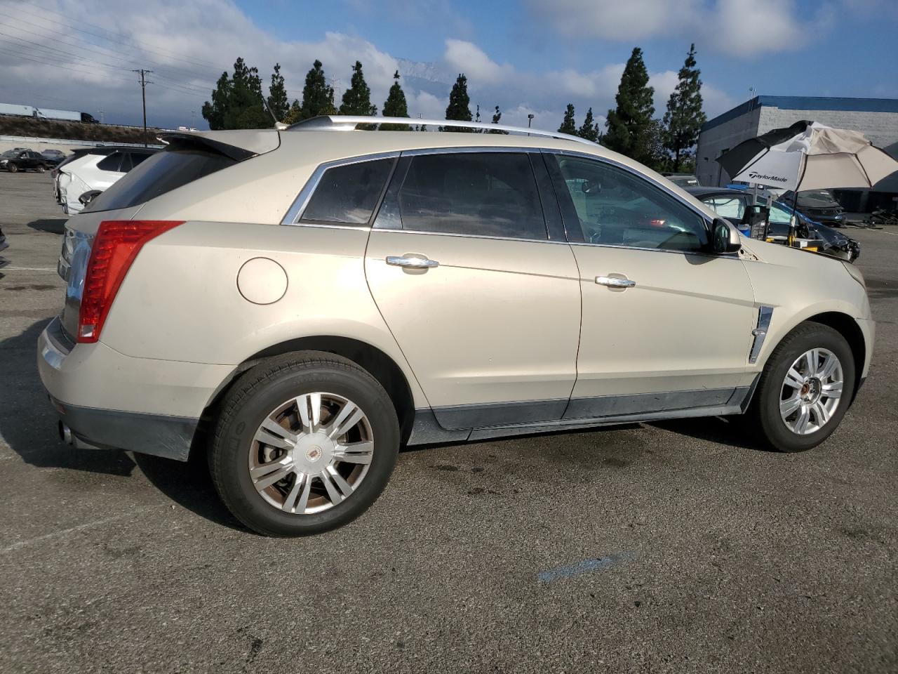 2011 Cadillac SRX VIN 3GYFNAEY9BS597476 Copart auction photo, front end damage thumbnail 3