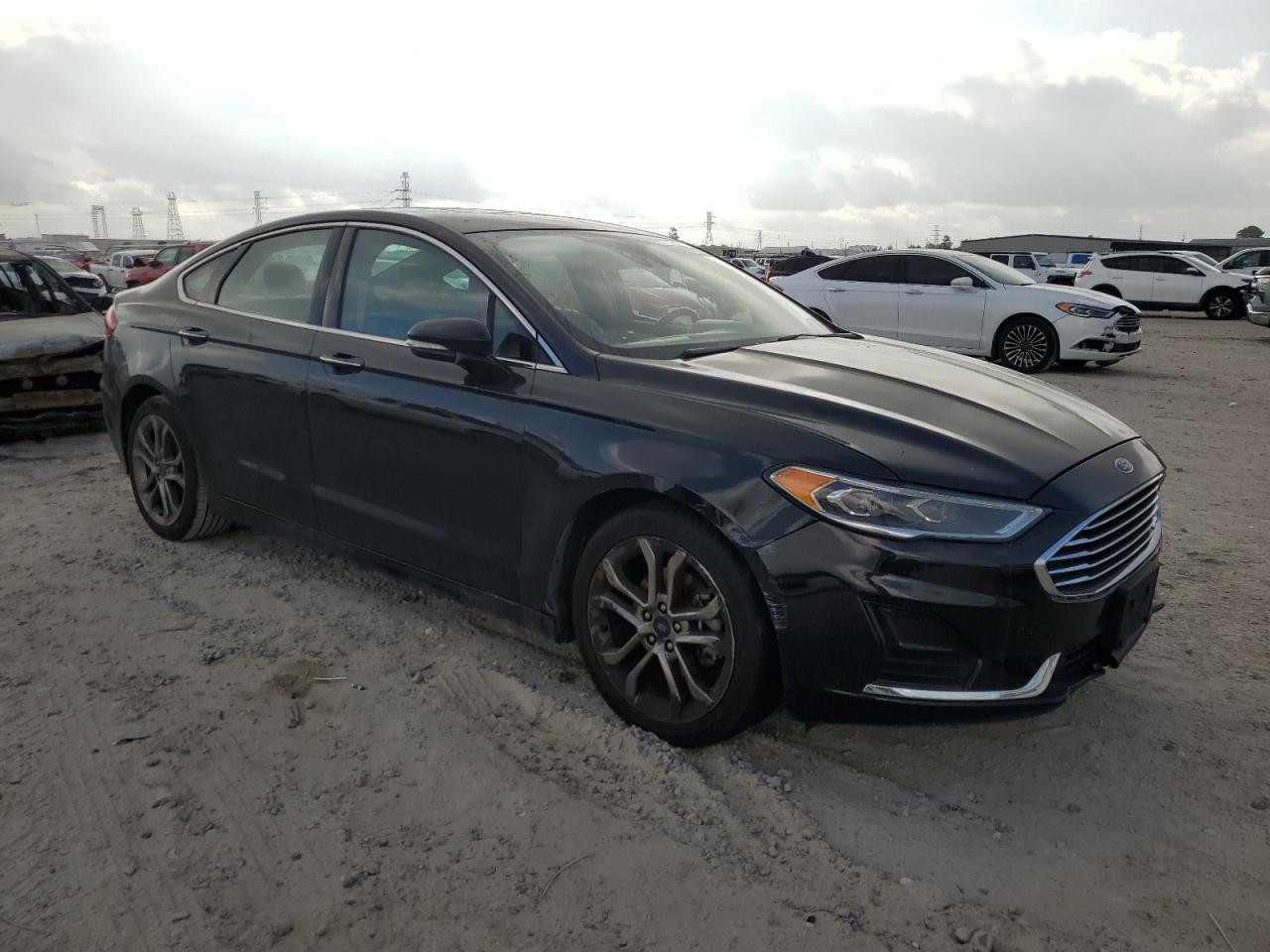 2019 Ford Fusion VIN 3FA6P0CDXKR253288 Copart auction photo, side / front end damage thumbnail 4