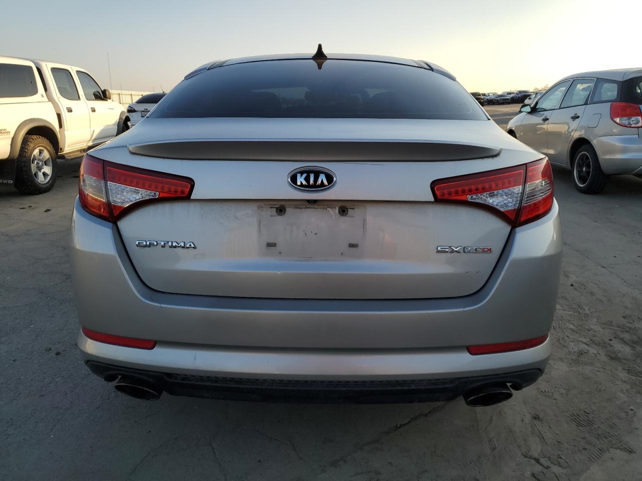2012 KIA Optima VIN 5XXGR4A62CG089717 Copart auction photo, side / front end damage thumbnail 6