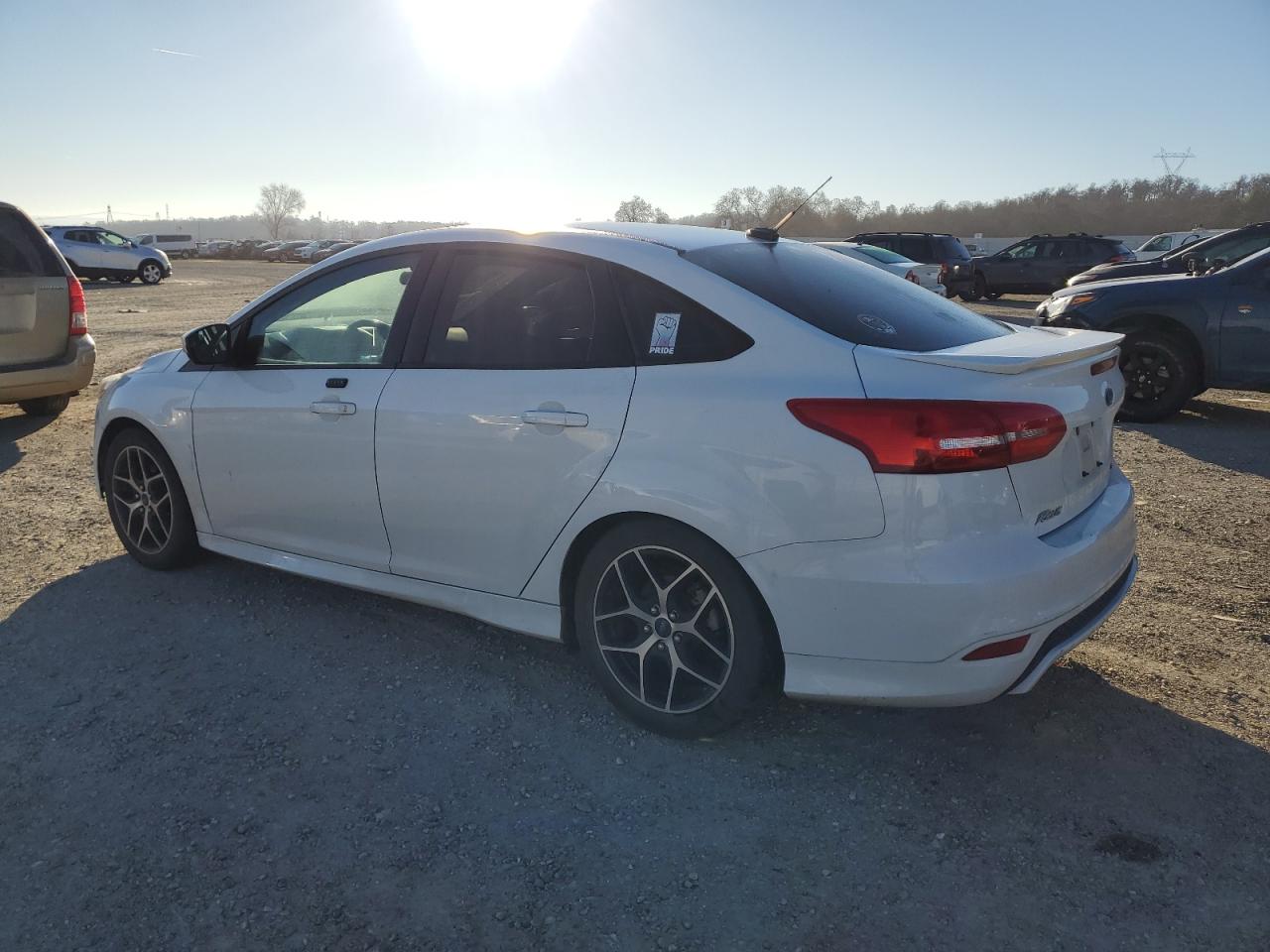 2016 Ford Focus VIN 1FADP3F29GL276196 Copart auction photo, side / rear end damage thumbnail 2