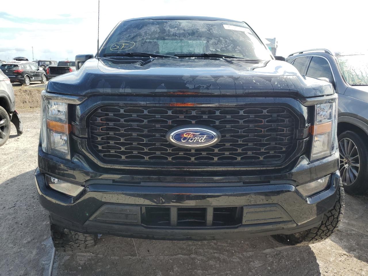 2023 Ford F-150 VIN 1FTEW1CP5PKE28616 Copart auction photo, water/flood damage thumbnail 5