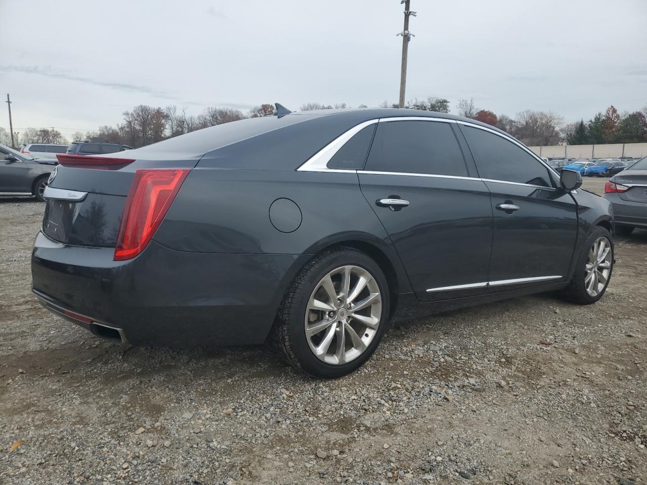 2014 Cadillac XTS VIN 2G61N5S33E9316213 Copart auction photo, front end / minor dent/scratches damage thumbnail 3