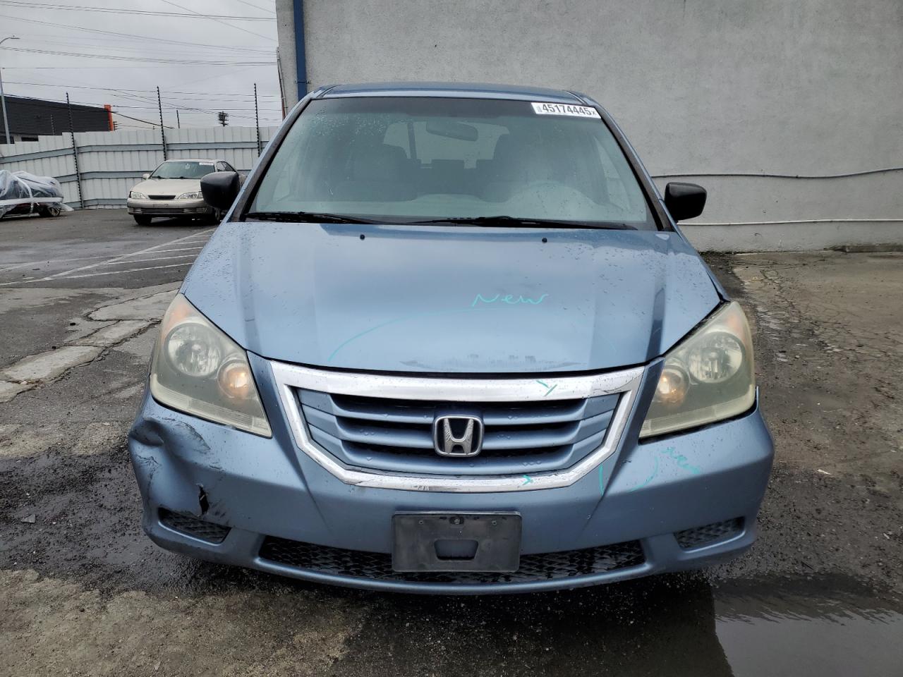 2010 Honda Odyssey VIN 5FNRL3H29AB001785 Copart auction photo, front end / rear end damage thumbnail 5