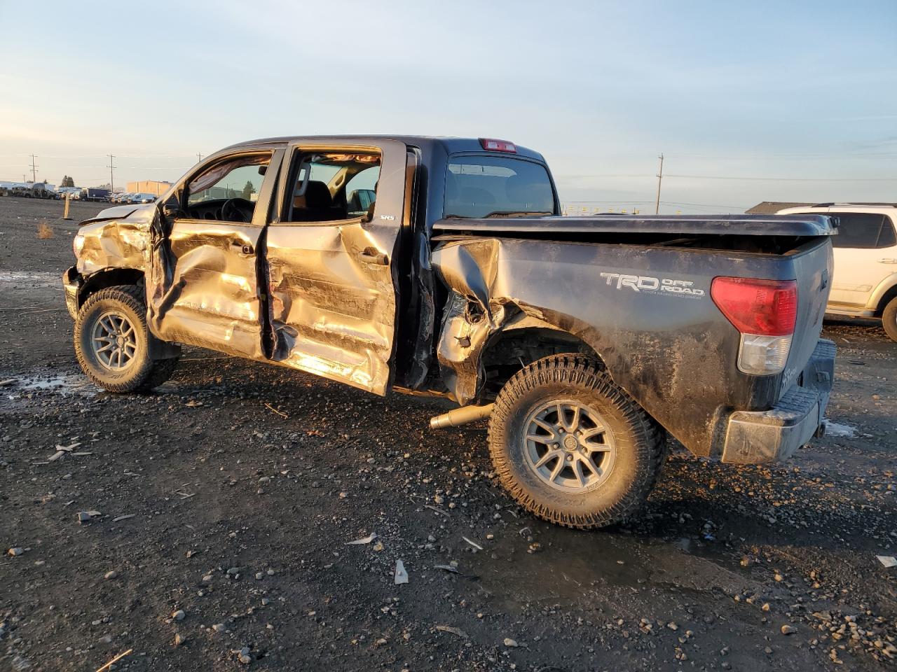 2012 Toyota Tundra VIN 5TFDY5F15CX253950 Copart auction photo, all over damage thumbnail 2