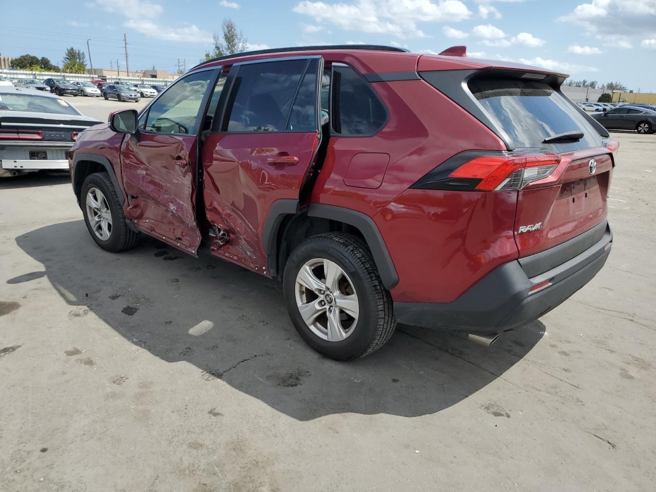 2019 Toyota RAV 4 VIN JTMW1RFV9KD500555 Copart auction photo, side damage thumbnail 2