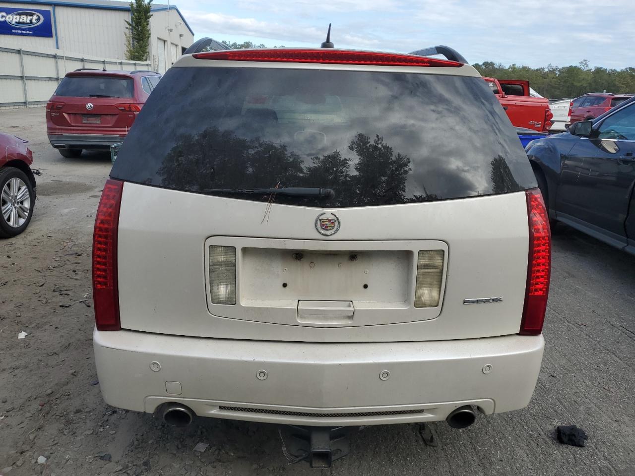 2009 Cadillac SRX VIN 1GYEE637890103564 Copart auction photo, minor dent/scratches damage thumbnail 6