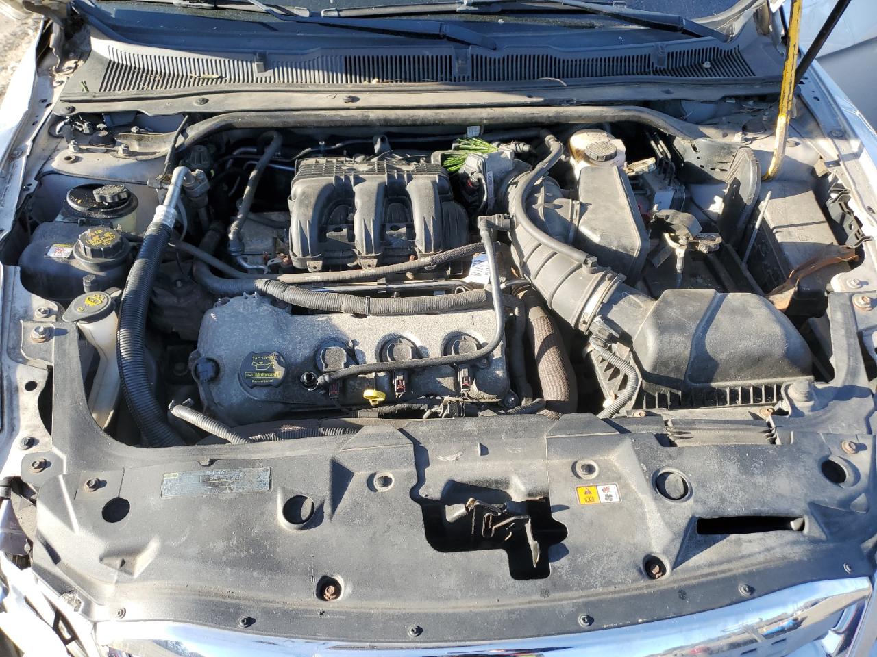 2010 Ford Taurus VIN 1FAHP2EW9AG169231 Copart auction photo, front end / top/roof damage thumbnail 11