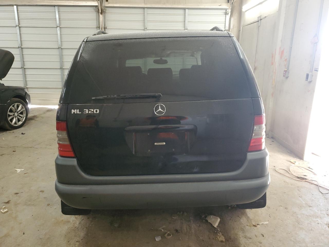 1999 Mercedes-Benz M-klasse VIN 4JGAB54E7XA136885 Copart auction photo, front end / undercarriage damage thumbnail 6