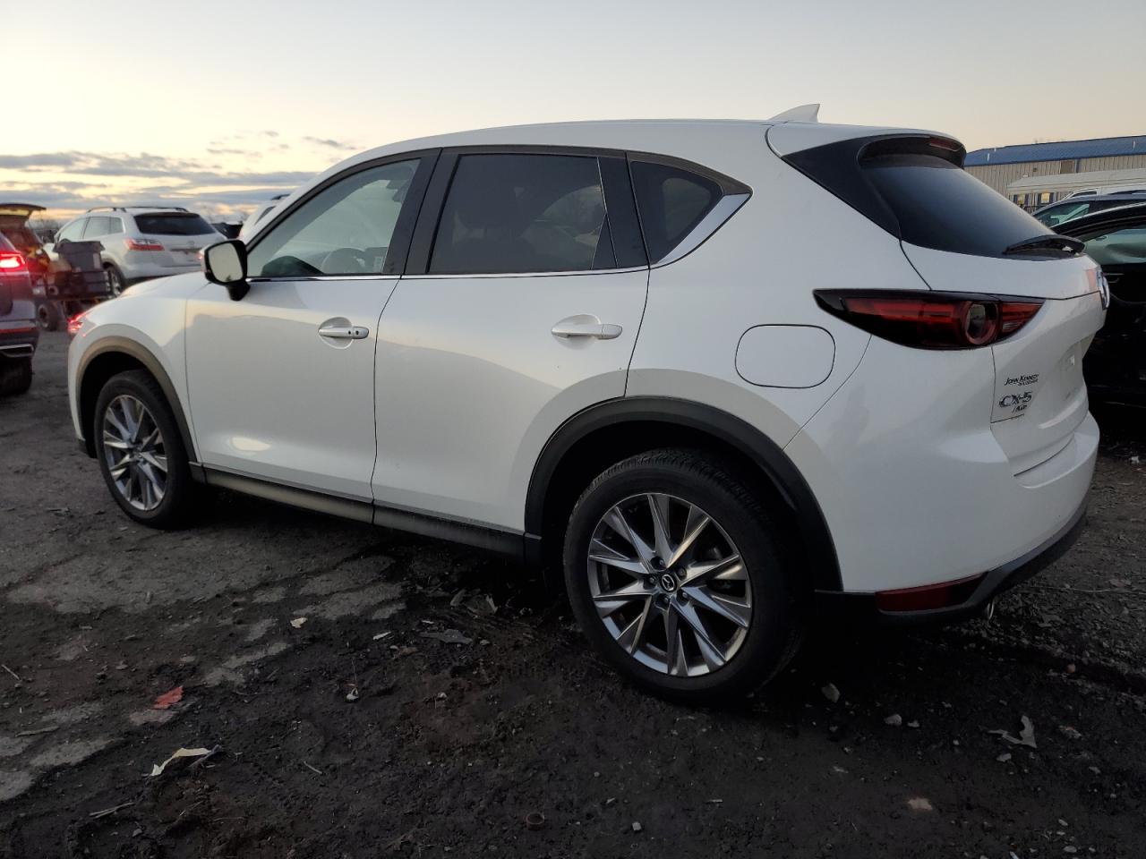 2021 Mazda CX-5 VIN JM3KFBDM7M0489767 Copart auction photo, burn - interior / side damage thumbnail 2