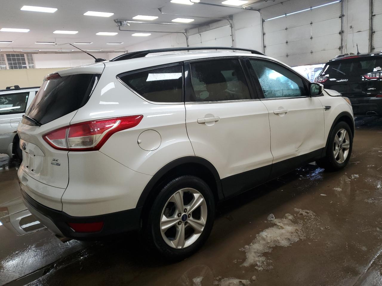 2014 Ford Escape VIN 1FMCU9GX7EUD89689 Copart auction photo, all over damage thumbnail 3