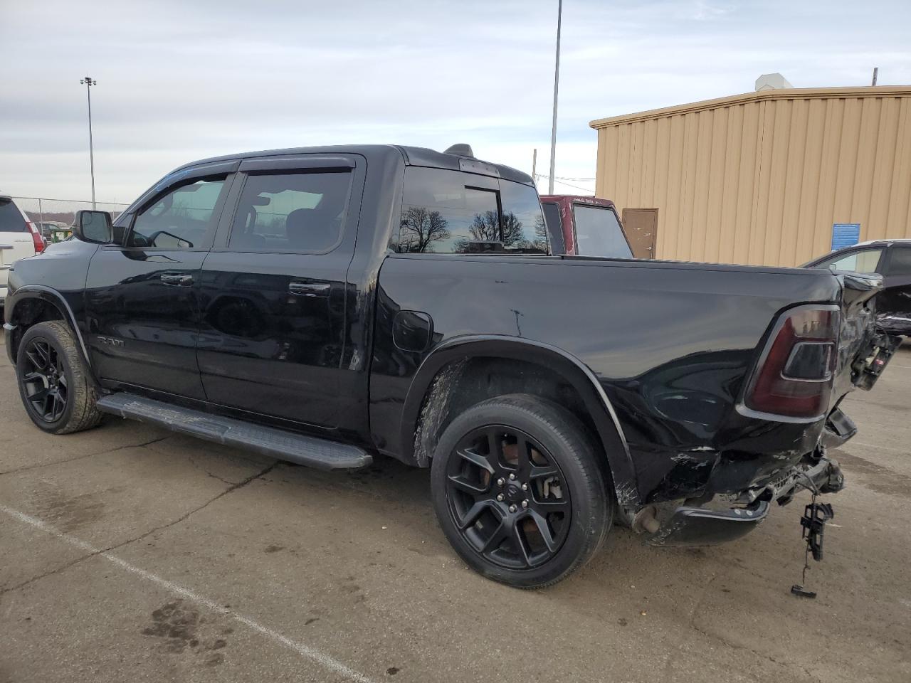 2021 RAM 1500 VIN 1C6SRFJT7MN581748 Copart auction photo, rear end damage thumbnail 2