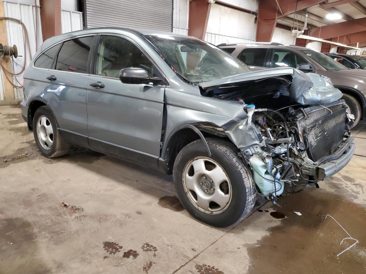 2010 Honda CR-V VIN 5J6RE4H30AL098892 Copart auction photo, front end / side damage thumbnail 4