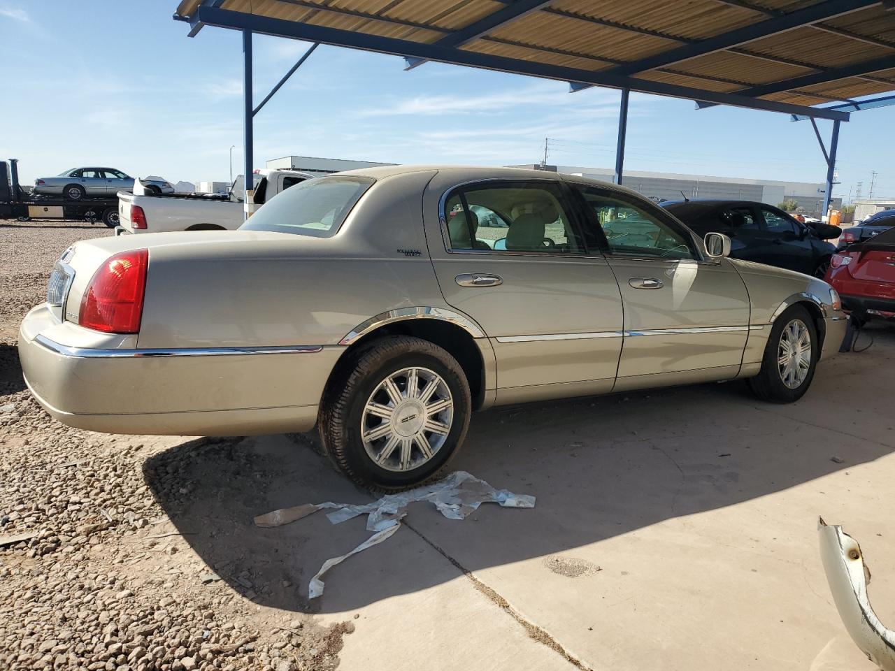2009 Lincoln Town Car VIN 2LNHM82V59X606533 Copart auction photo, side damage thumbnail 3
