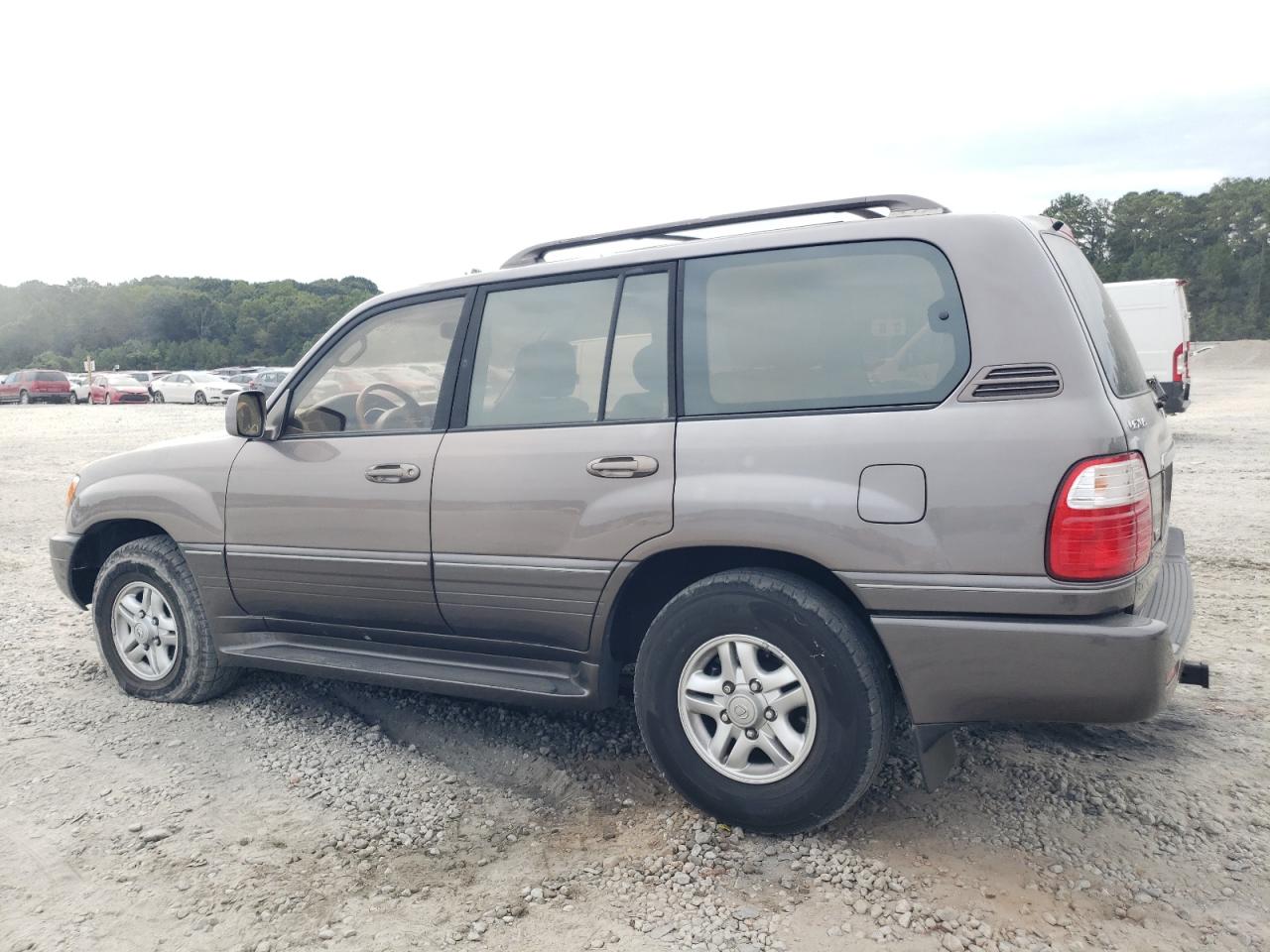 2000 Lexus LX VIN JT6HT00W6Y0109757 Copart auction photo, minor dent/scratches damage thumbnail 2