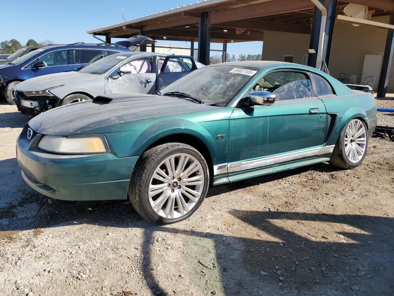 2000 Ford Mustang VIN 1FAFP4043YF263744 - Copart auction photo