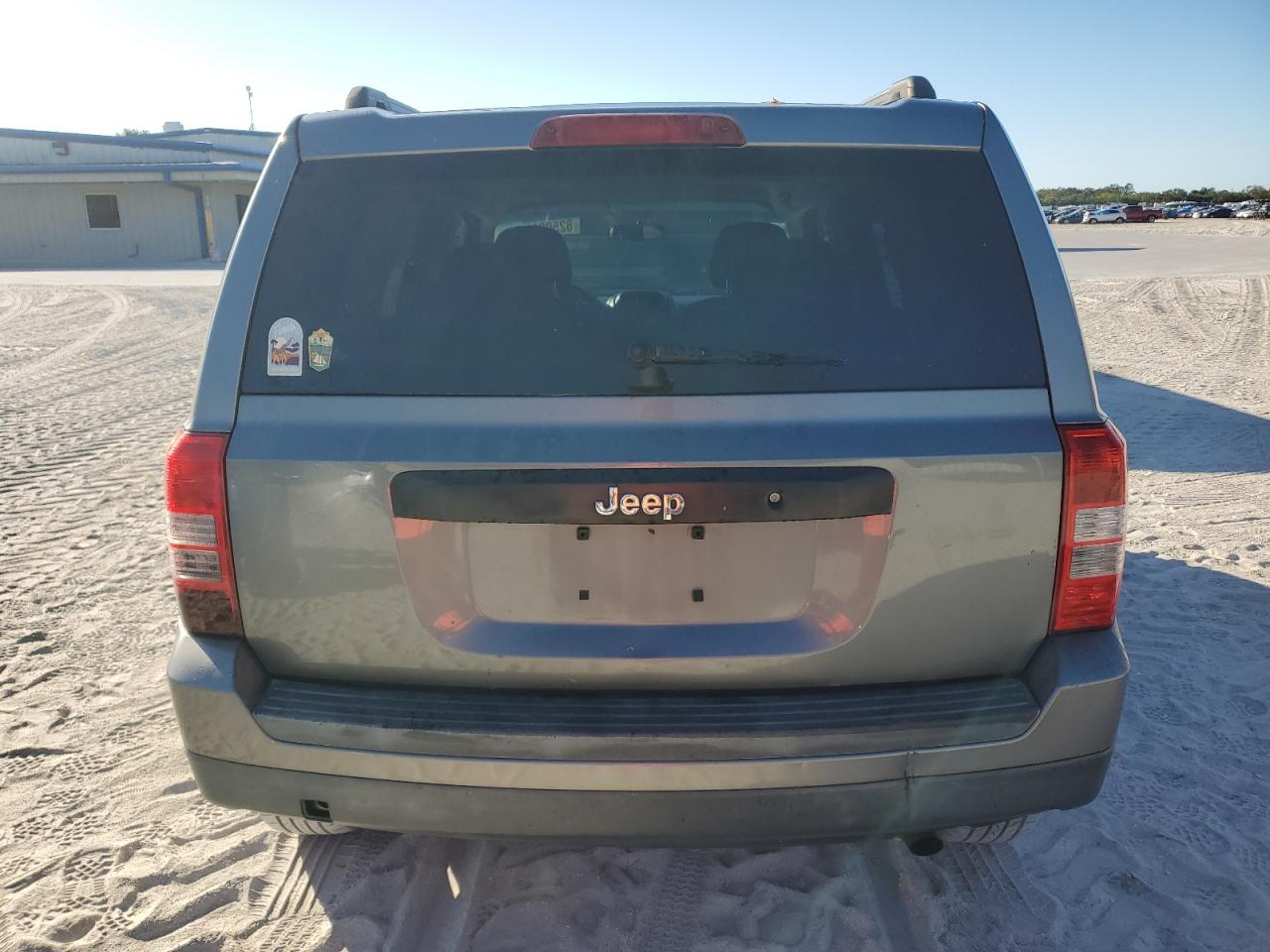 2012 Jeep Liberty (Patriot) VIN 1C4NJPBB7CD566521 Copart auction photo, minor dent/scratches damage thumbnail 6