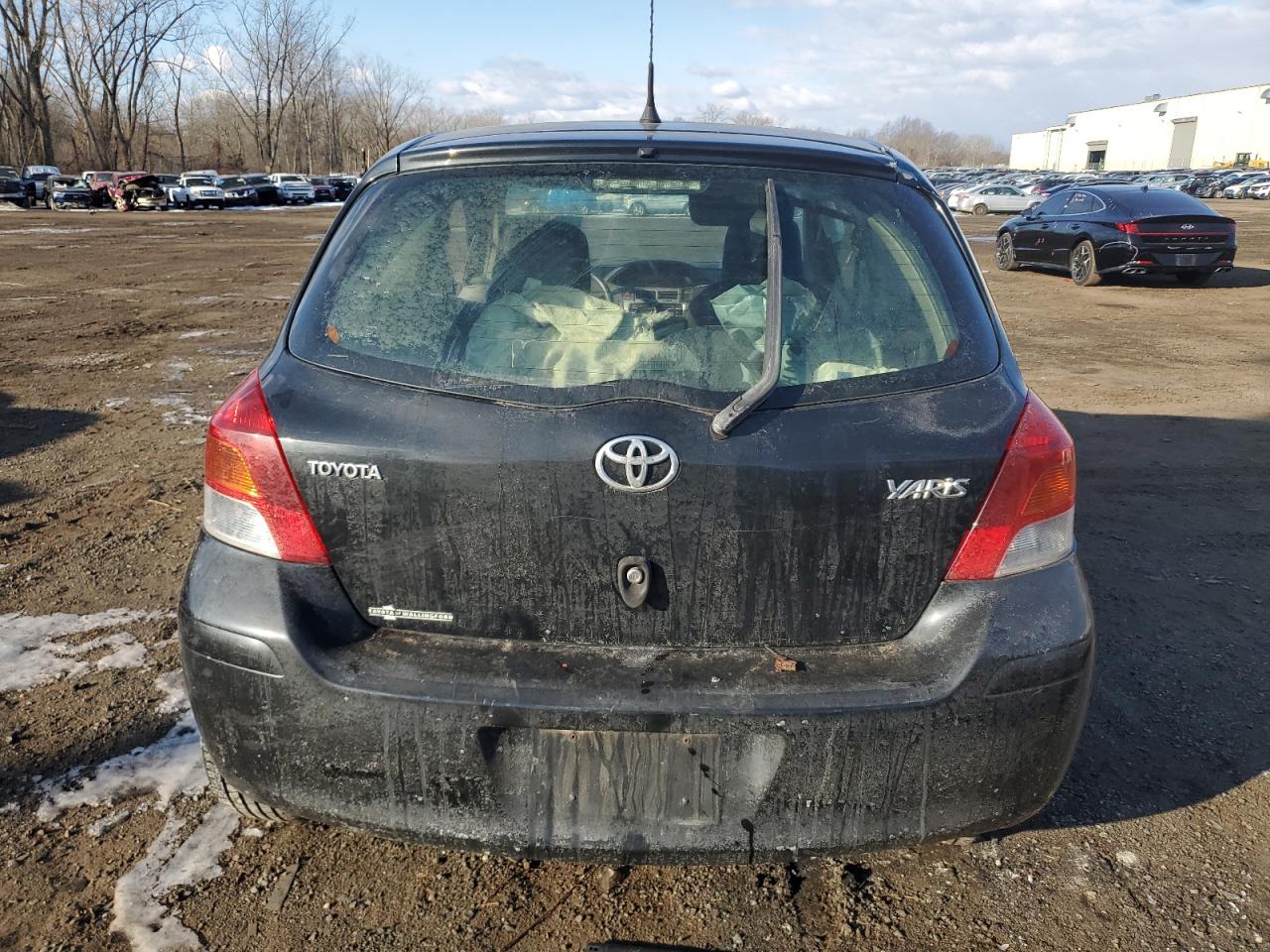 2009 Toyota Yaris VIN JTDJT903295244629 Copart auction photo, front end / side damage thumbnail 6
