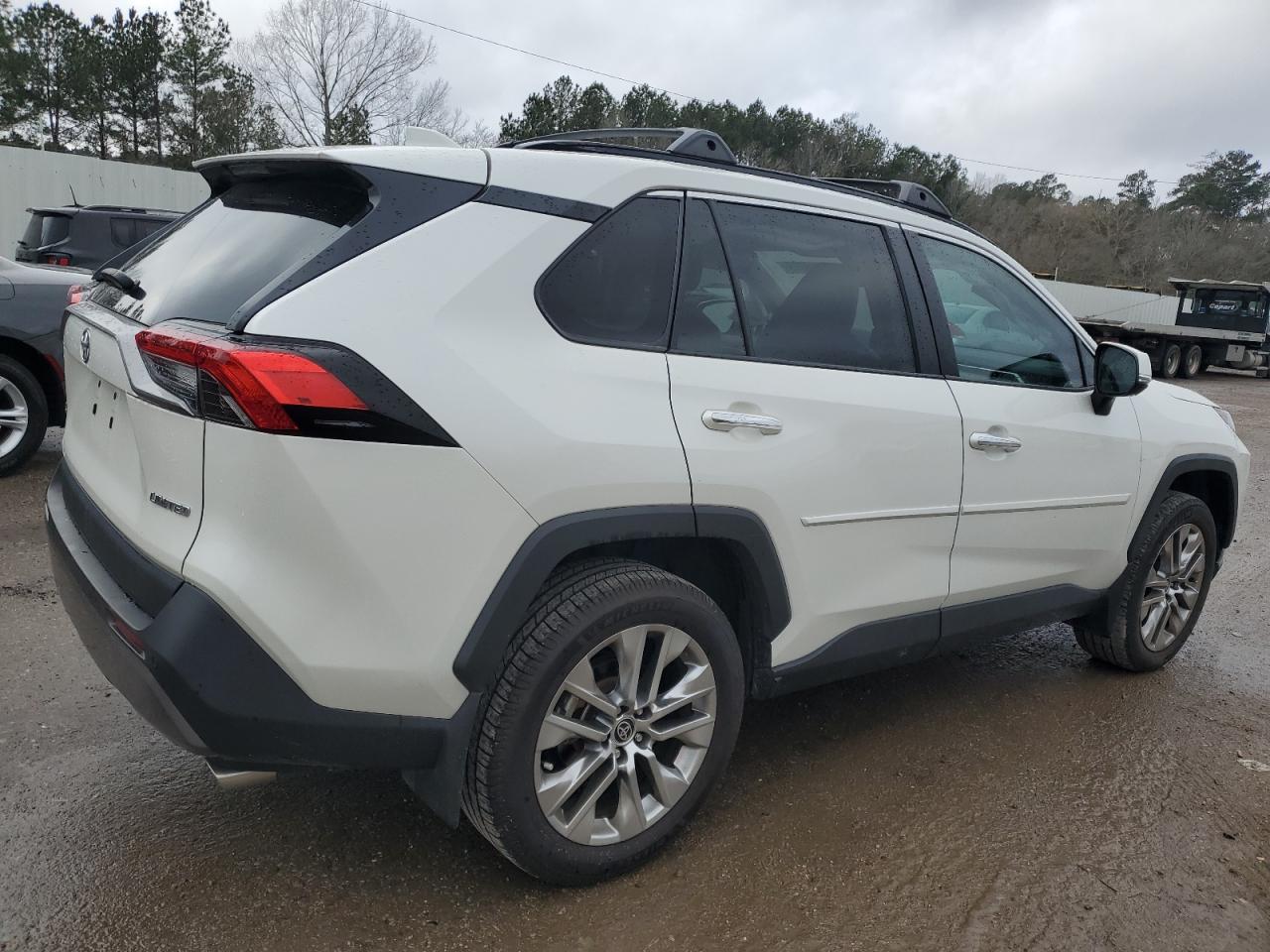 2021 Toyota RAV 4 VIN 2T3Y1RFV1MW153477 Copart auction photo, side / minor dent/scratches damage thumbnail 3