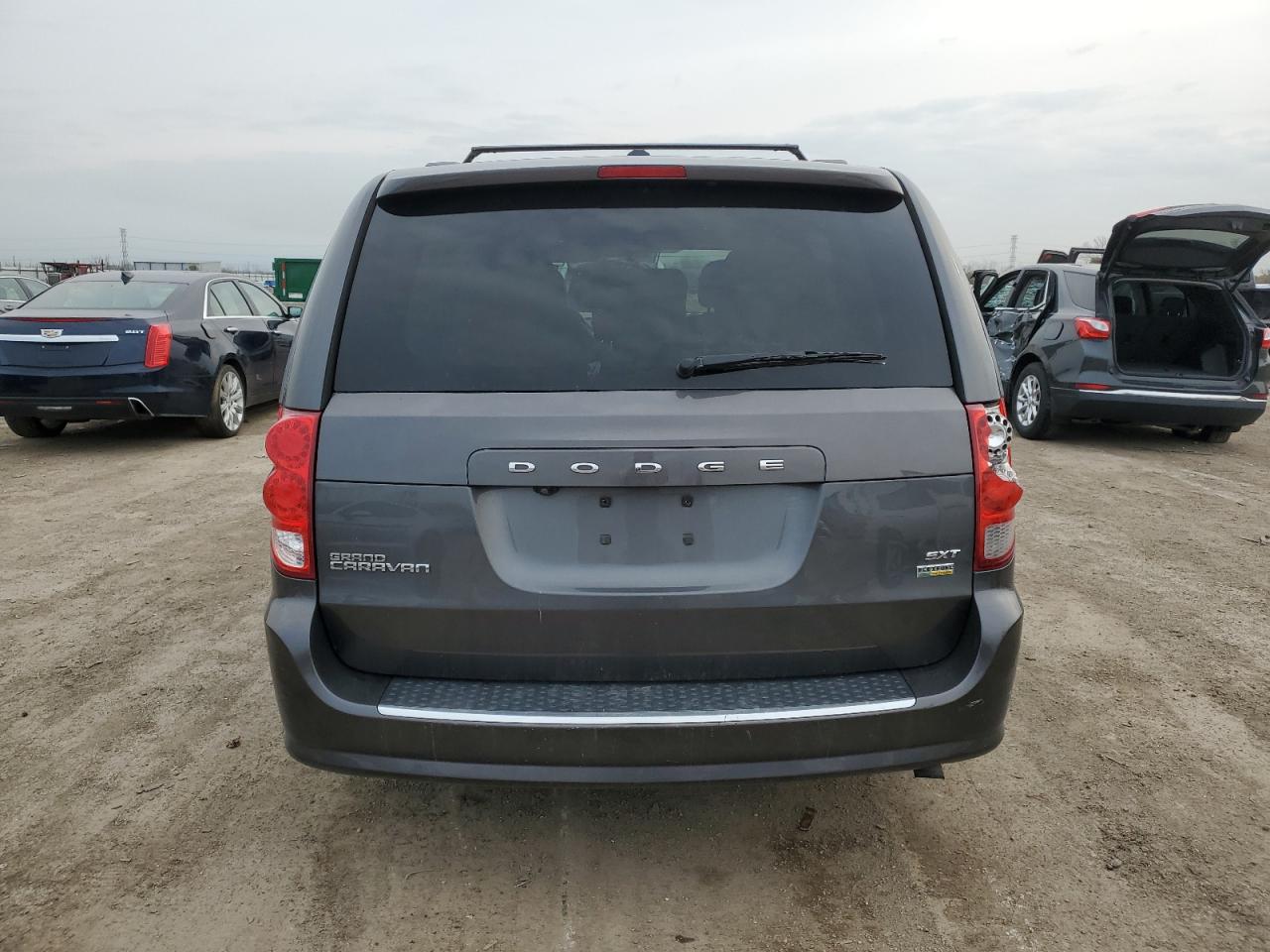 2018 Dodge Caravan VIN 2C4RDGCG9JR129830 Copart auction photo, all over damage thumbnail 6
