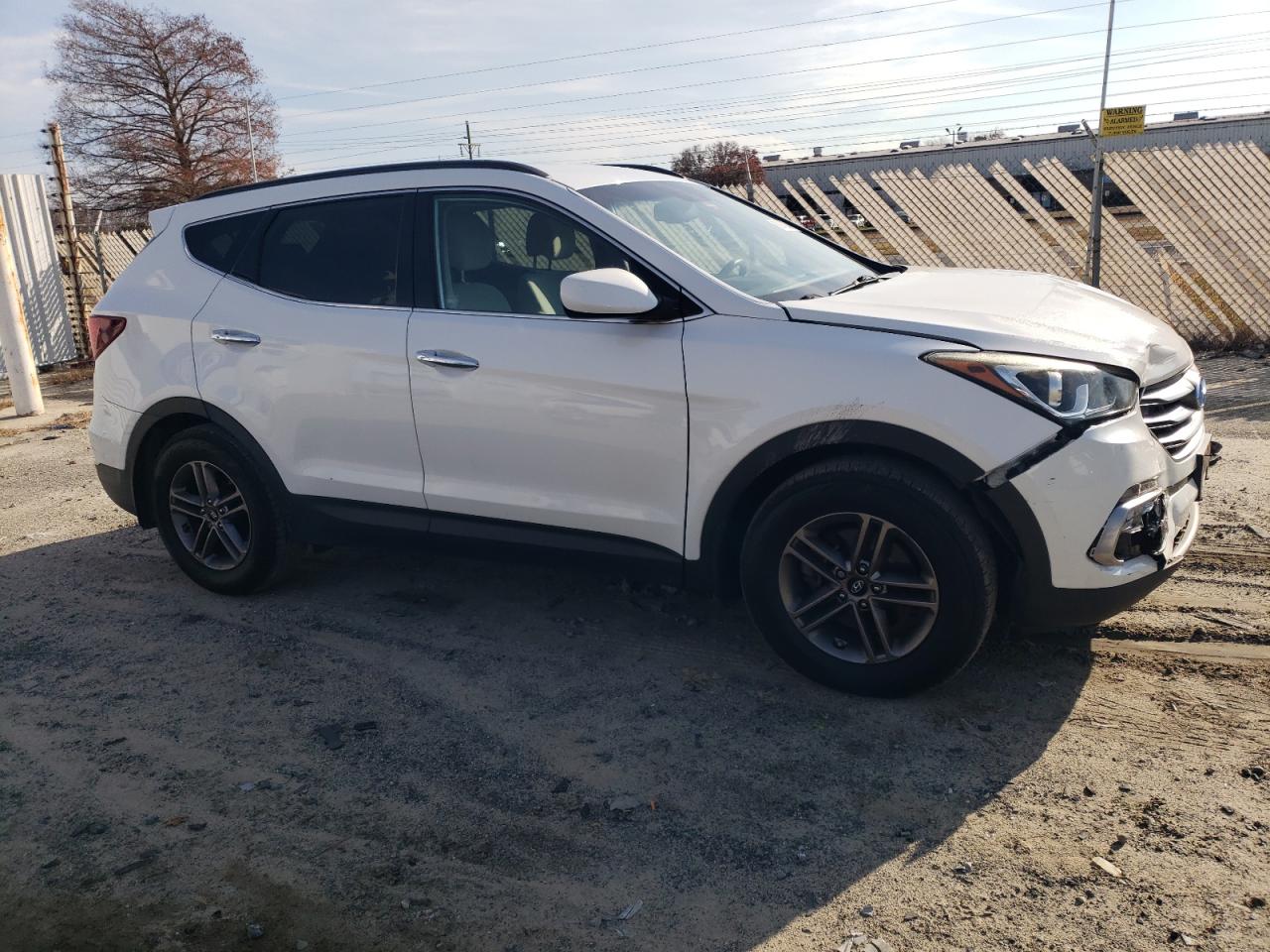 2017 Hyundai Santa Fe VIN 5NMZU3LB4HH007877 Copart auction photo, front end / all over damage thumbnail 4
