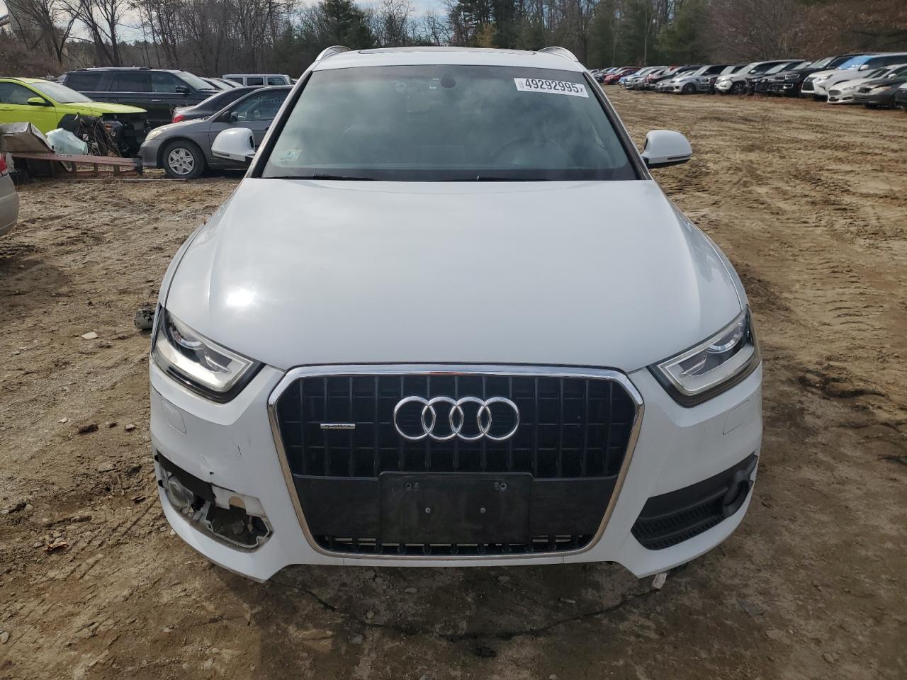2015 Audi Q3 VIN WA1GFCFS6FR011963 Copart auction photo, front end / side damage thumbnail 5