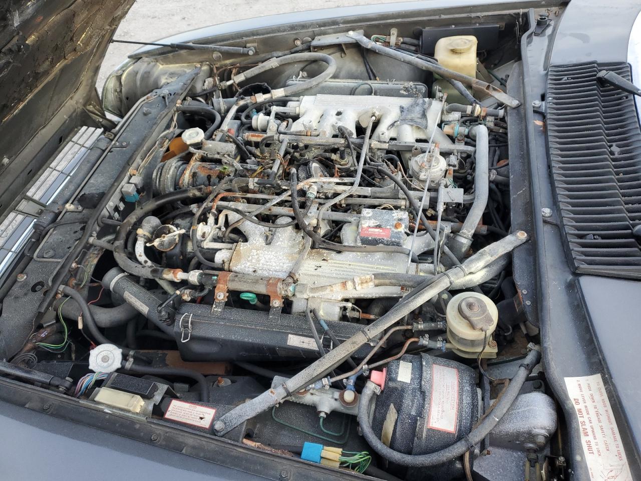 1988 Jaguar XJS VIN SAJNA5844JC145146 Copart auction photo, burn - engine damage thumbnail 11