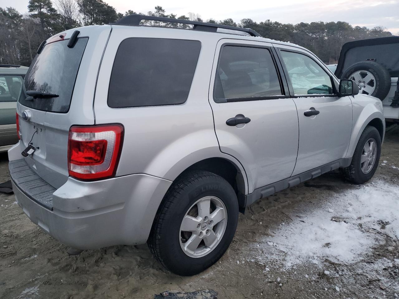 2011 Ford Escape VIN 1FMCU0D73BKC25556 Copart auction photo, front end / minor dent/scratches damage thumbnail 3