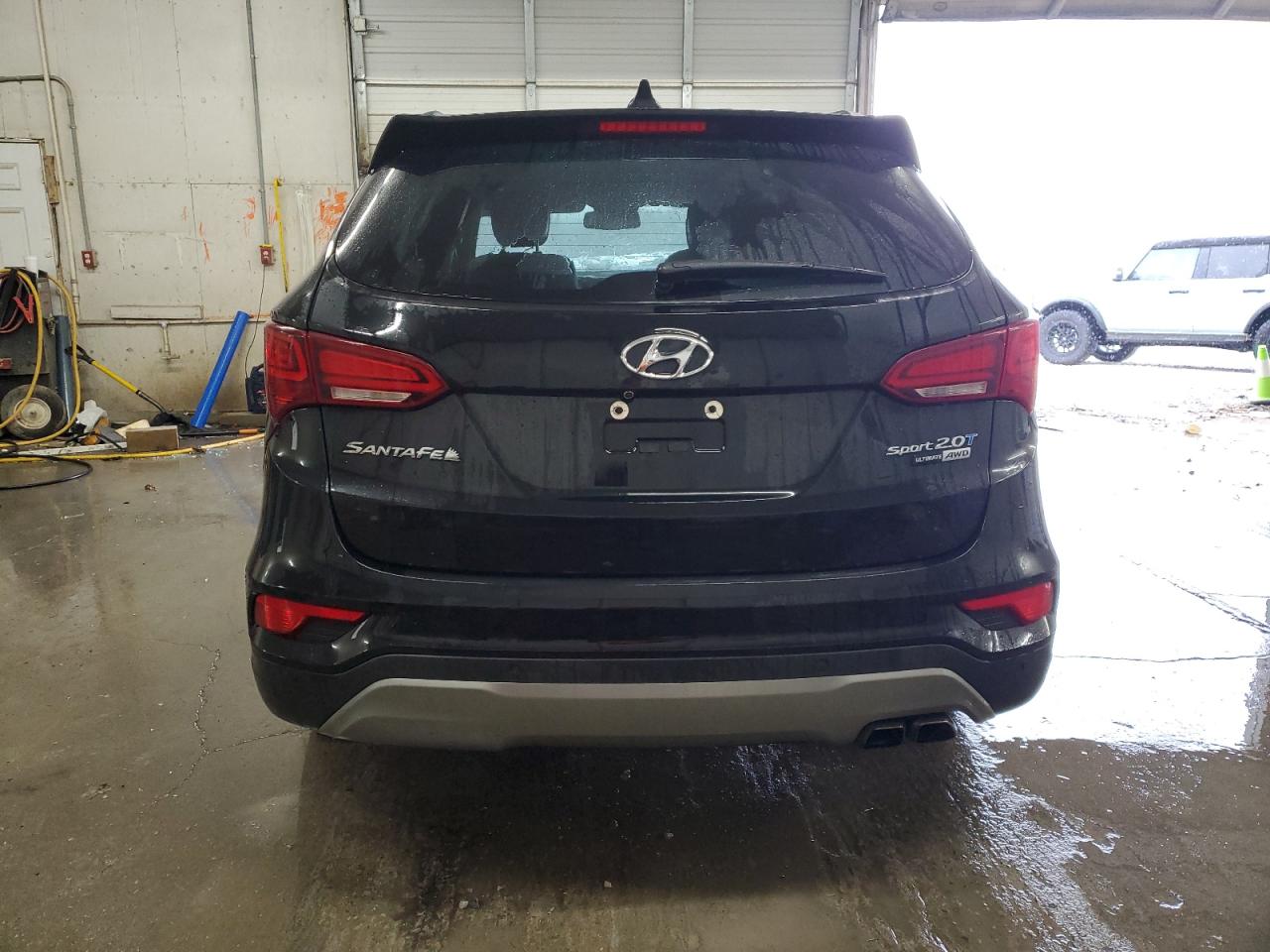 2018 Hyundai Santa Fe VIN 5XYZWDLA2JG509715 Copart auction photo, front end / minor dent/scratches damage thumbnail 6