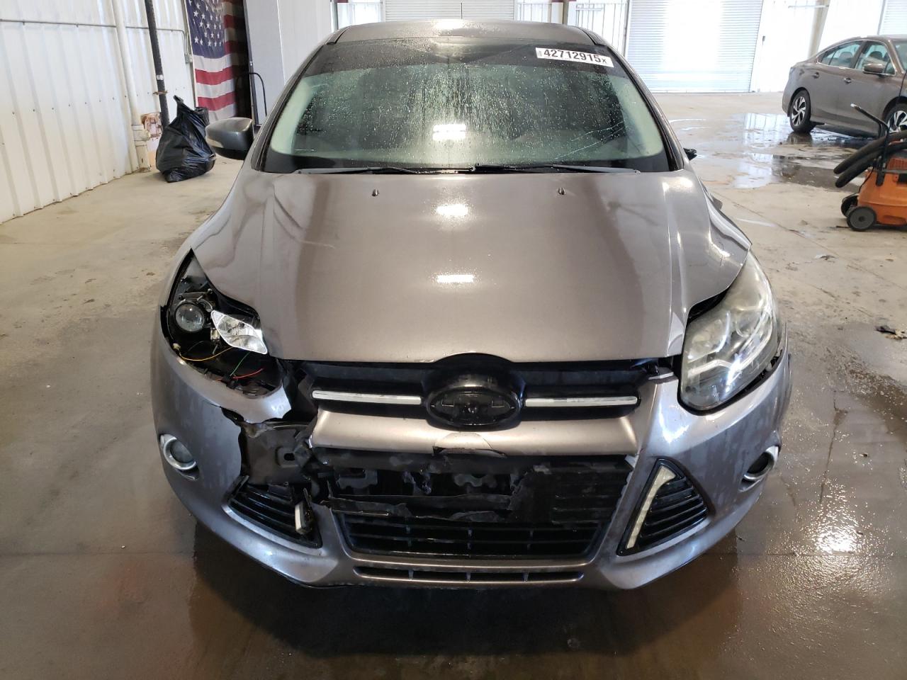 2012 Ford Focus VIN 1FAHP3F23CL378511 Copart auction photo, all over damage thumbnail 5