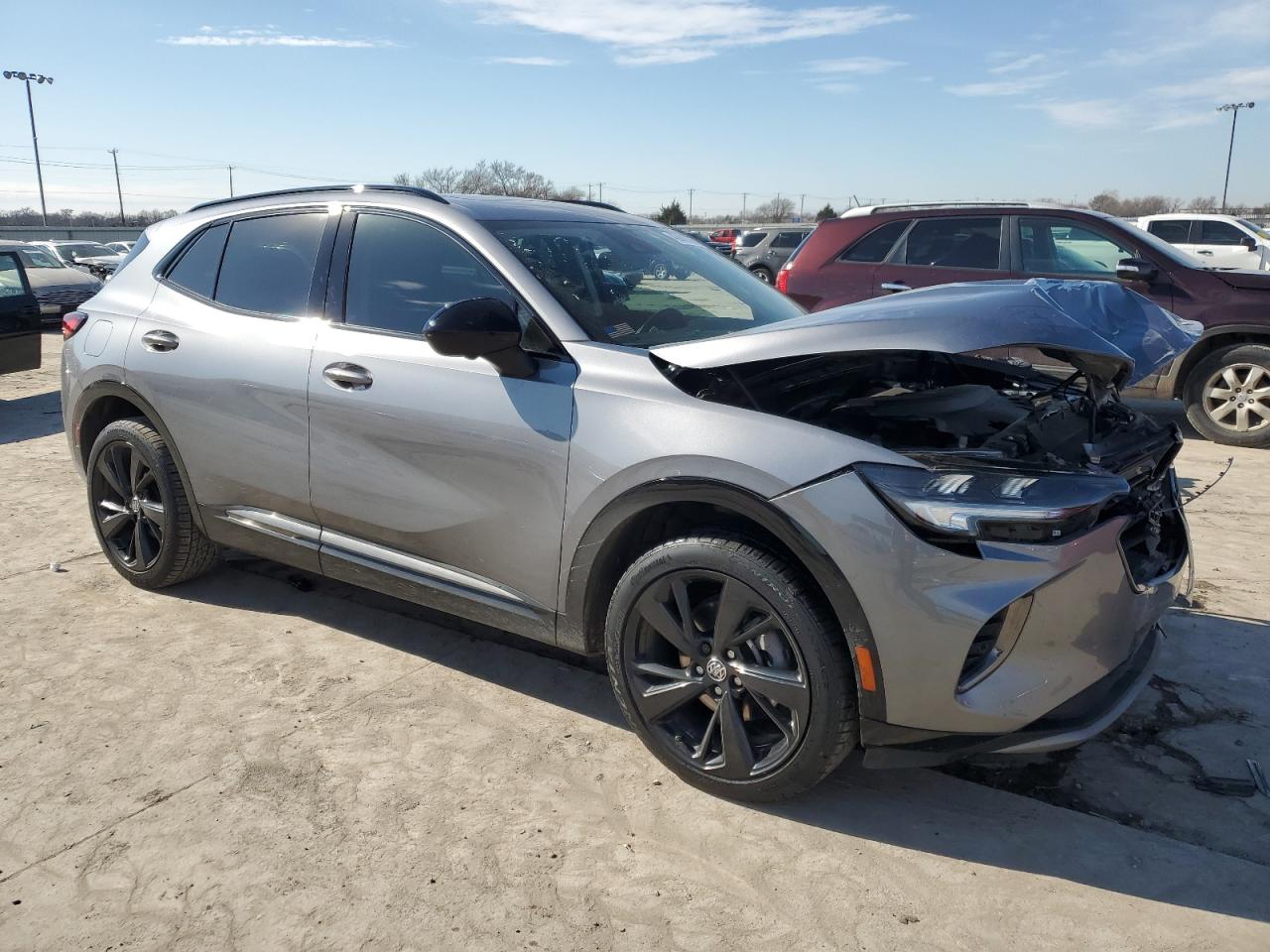 2022 Buick Envision VIN LRBFZNR47ND053473 Copart auction photo, front end / hail damage thumbnail 4