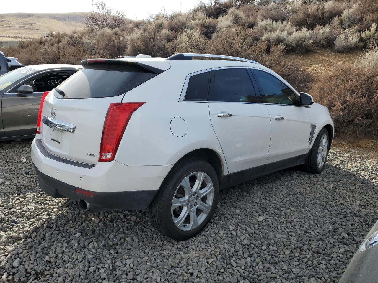 2015 Cadillac SRX VIN 3GYFNGE31FS607737 Copart auction photo, front end damage thumbnail 3