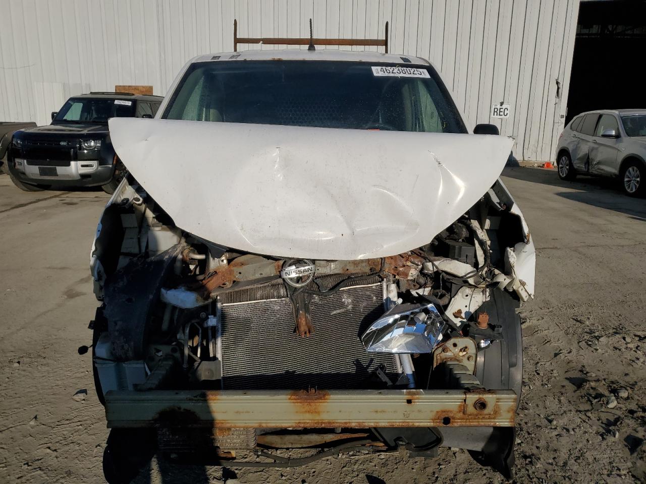 2015 Nissan NV VIN 3N6CM0KN0FK713828 Copart auction photo, front end damage thumbnail 5
