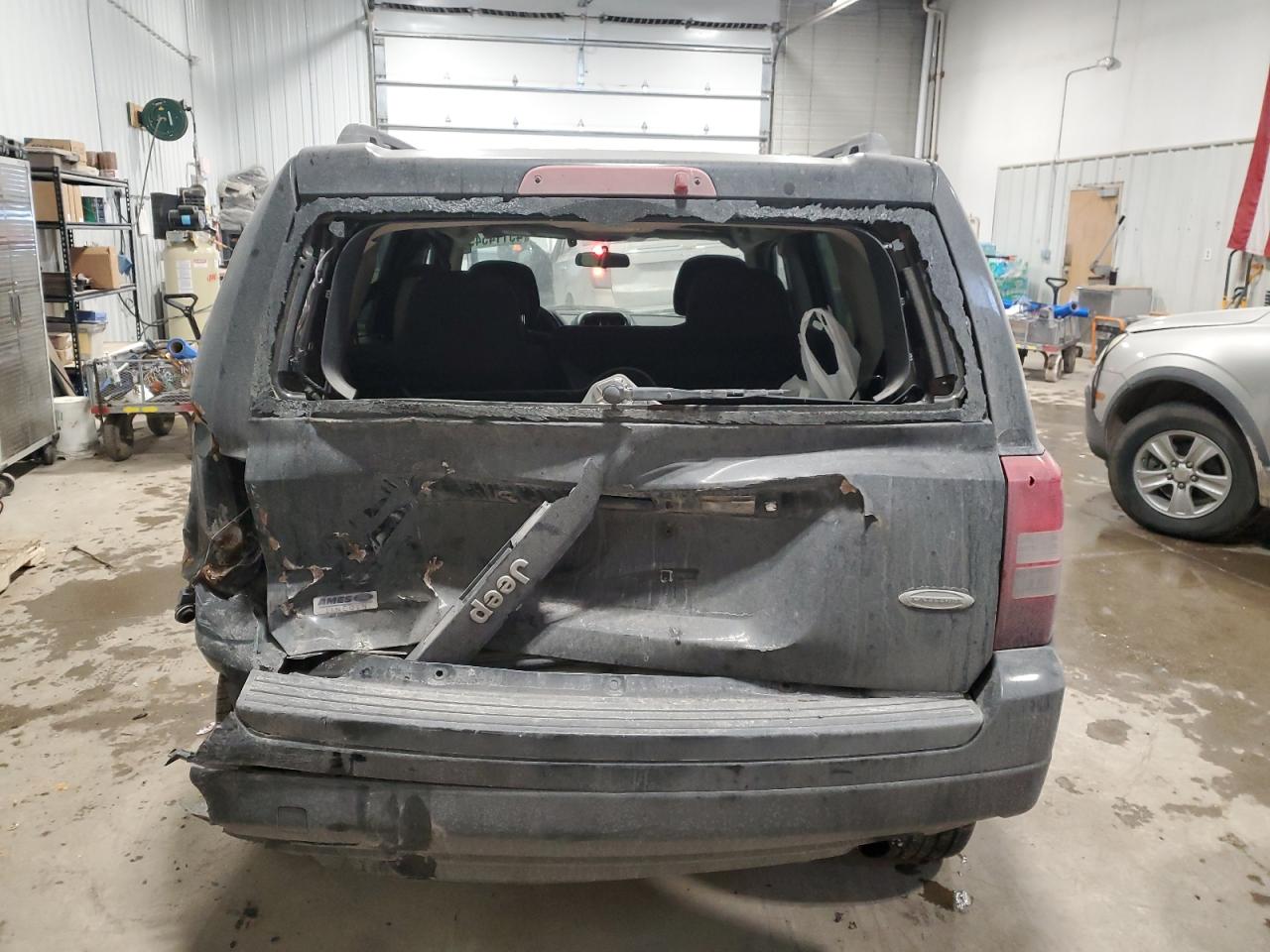 2013 Jeep Liberty (Patriot) VIN 1C4NJPFB4DD255625 Copart auction photo, all over / undercarriage damage thumbnail 6