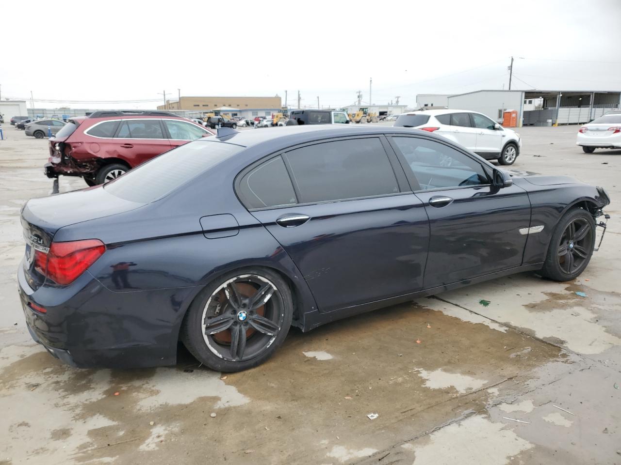 2015 BMW 7er VIN WBAYF8C55FD654093 Copart auction photo, front end / minor dent/scratches damage thumbnail 3