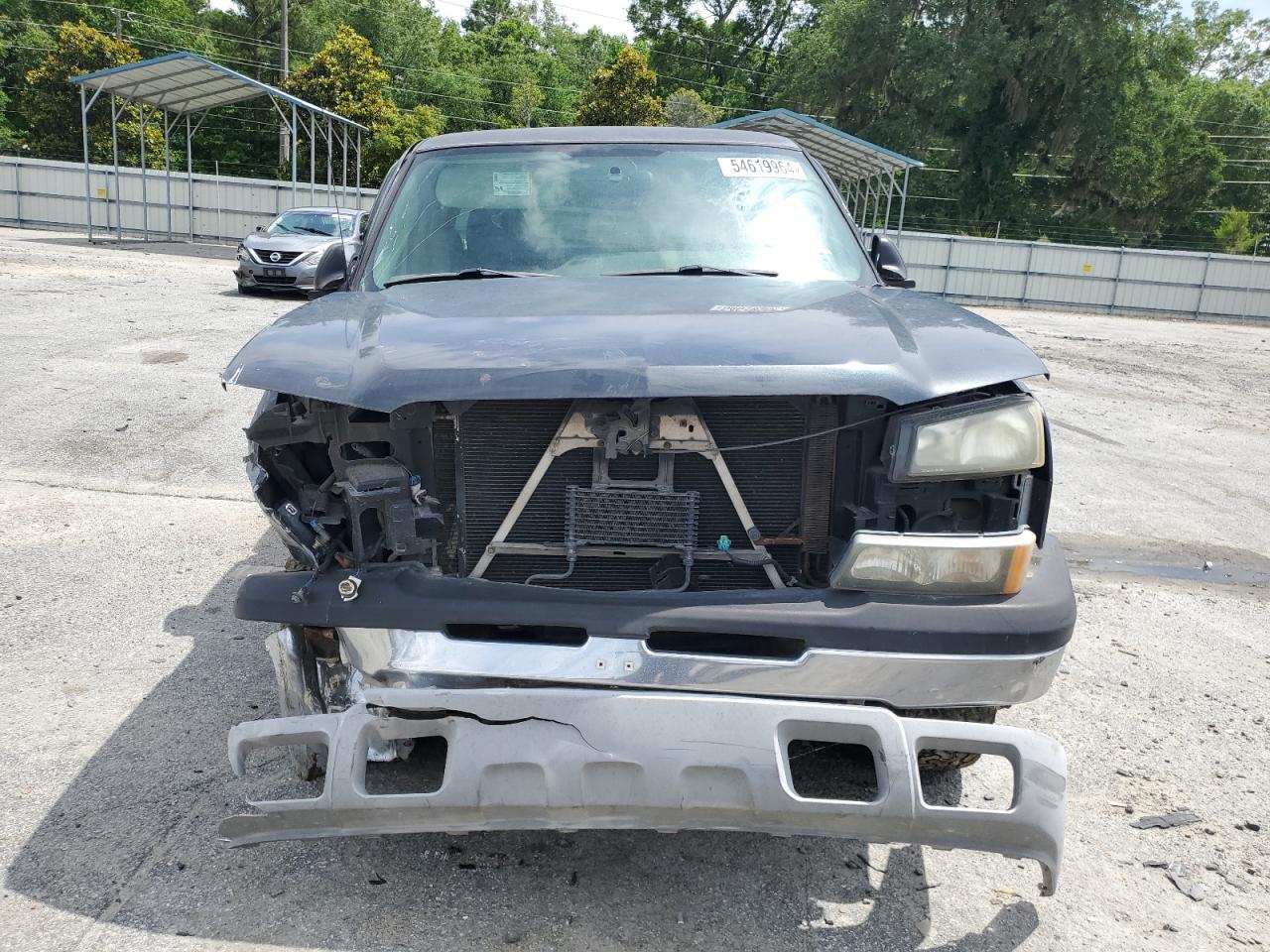2005 Chevrolet Silverado VIN 1GCEK19Z25Z228463 Copart auction photo, front end / side damage thumbnail 5